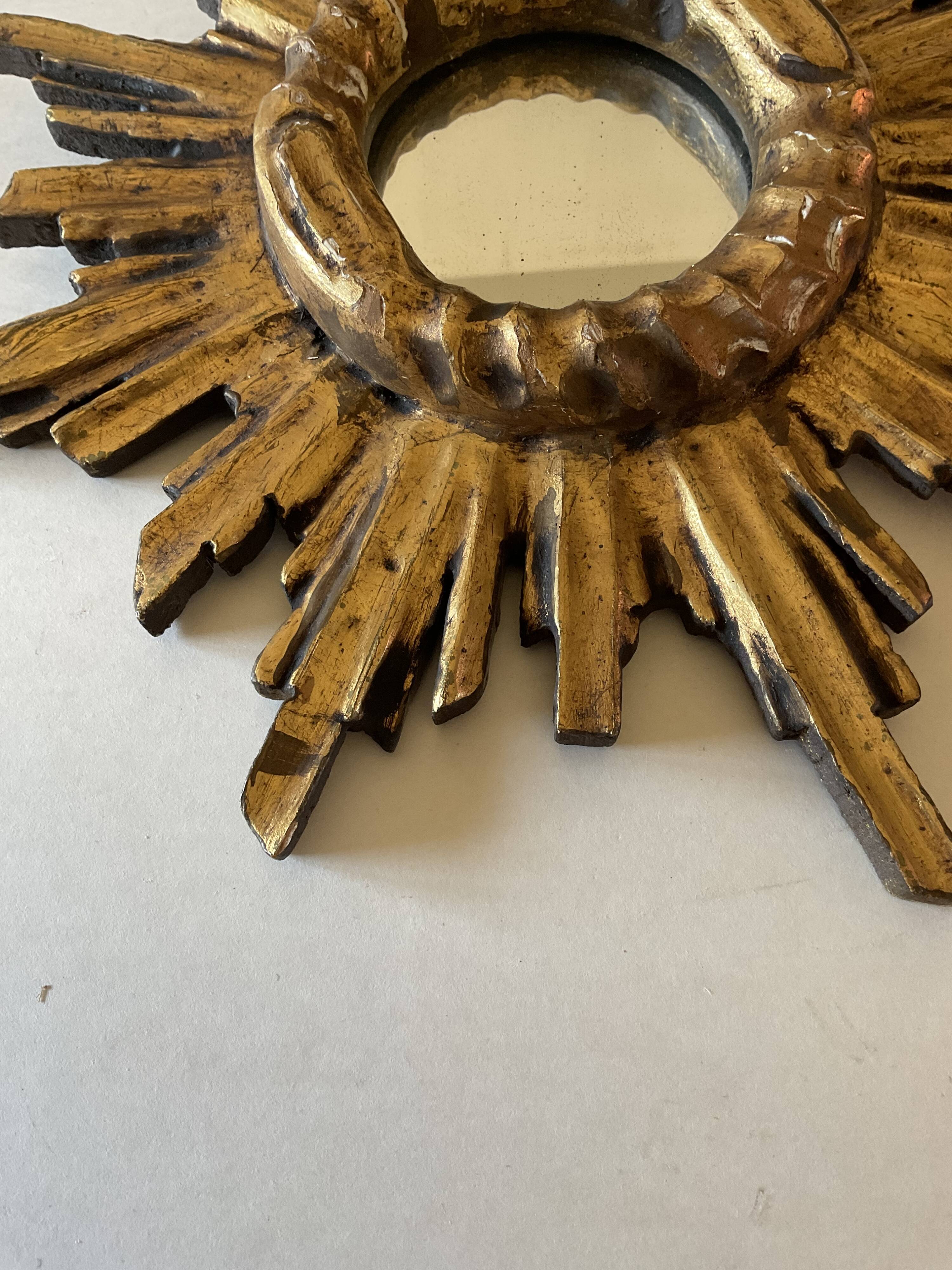 Miroir soleil vintage en bois doré