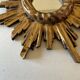 Miroir soleil vintage en bois doré