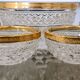Salad bowl and diamond-shaped bowls in brass.