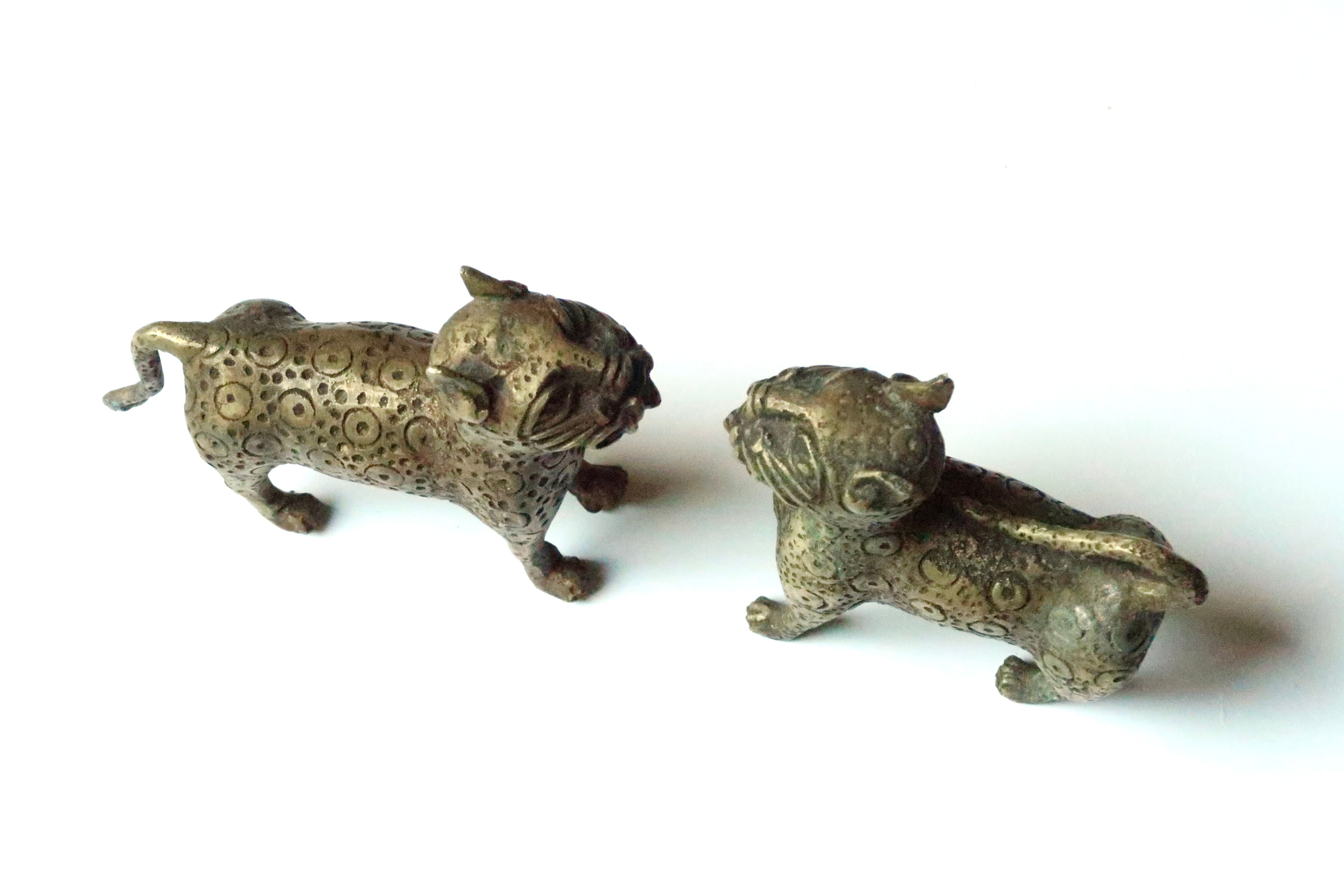 Book greenhouse, bronze leopards, 70s