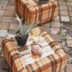 Pair of vintage 70s fabric coffee tables with glass tops