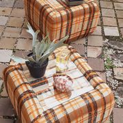 Pair of vintage 70s fabric coffee tables with glass tops