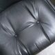 Black leather armchair by Charles Pollock for Knoll International