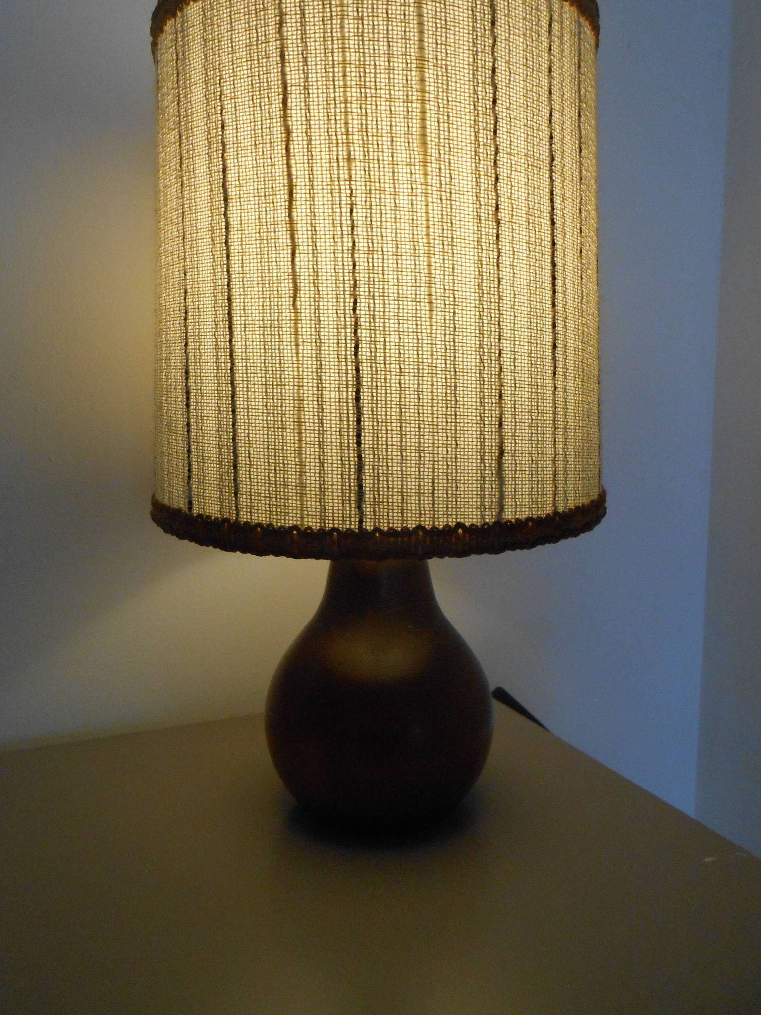 Carved wood lamp and wool yarn lampshade