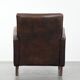Vintage sheepskin leather design armchair in a dark cognac colour