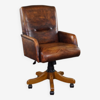 Adjustable sheepskin leather office chair in good condition, English style, swivel, and tilt functio