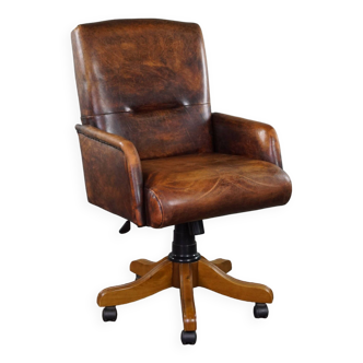 Adjustable sheepskin leather office chair in good condition, English style, swivel, and tilt functio