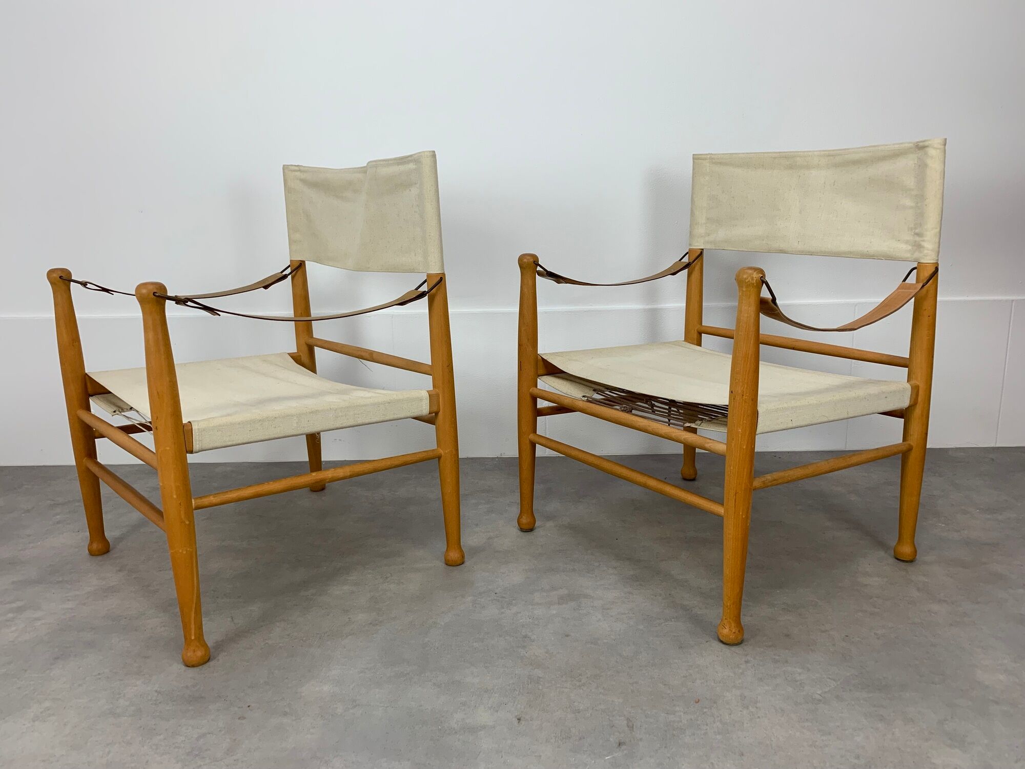 Pair of safari armchairs canvas and leather stretched