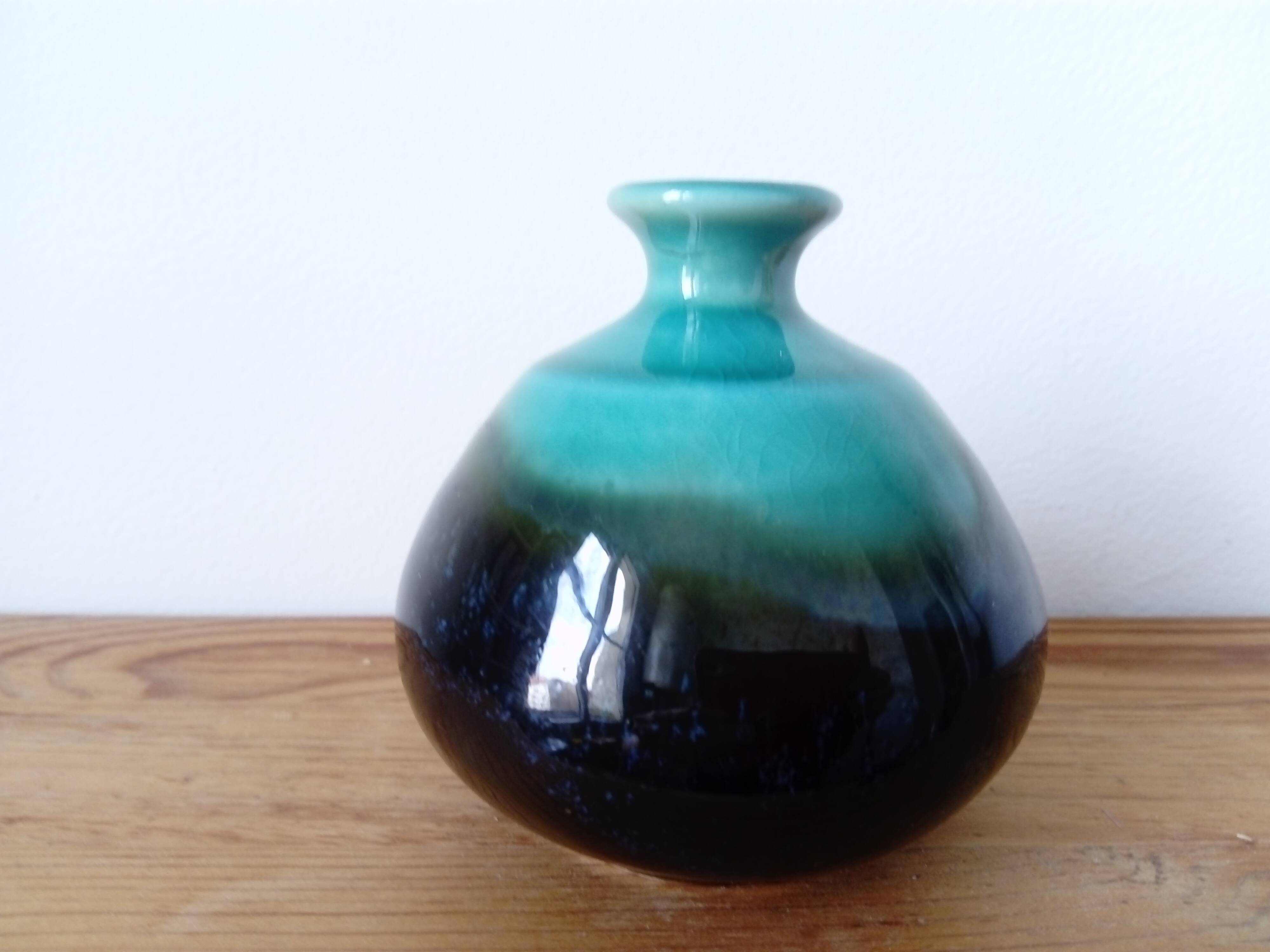 Small brown and turquoise ceramic vase