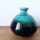 Small brown and turquoise ceramic vase