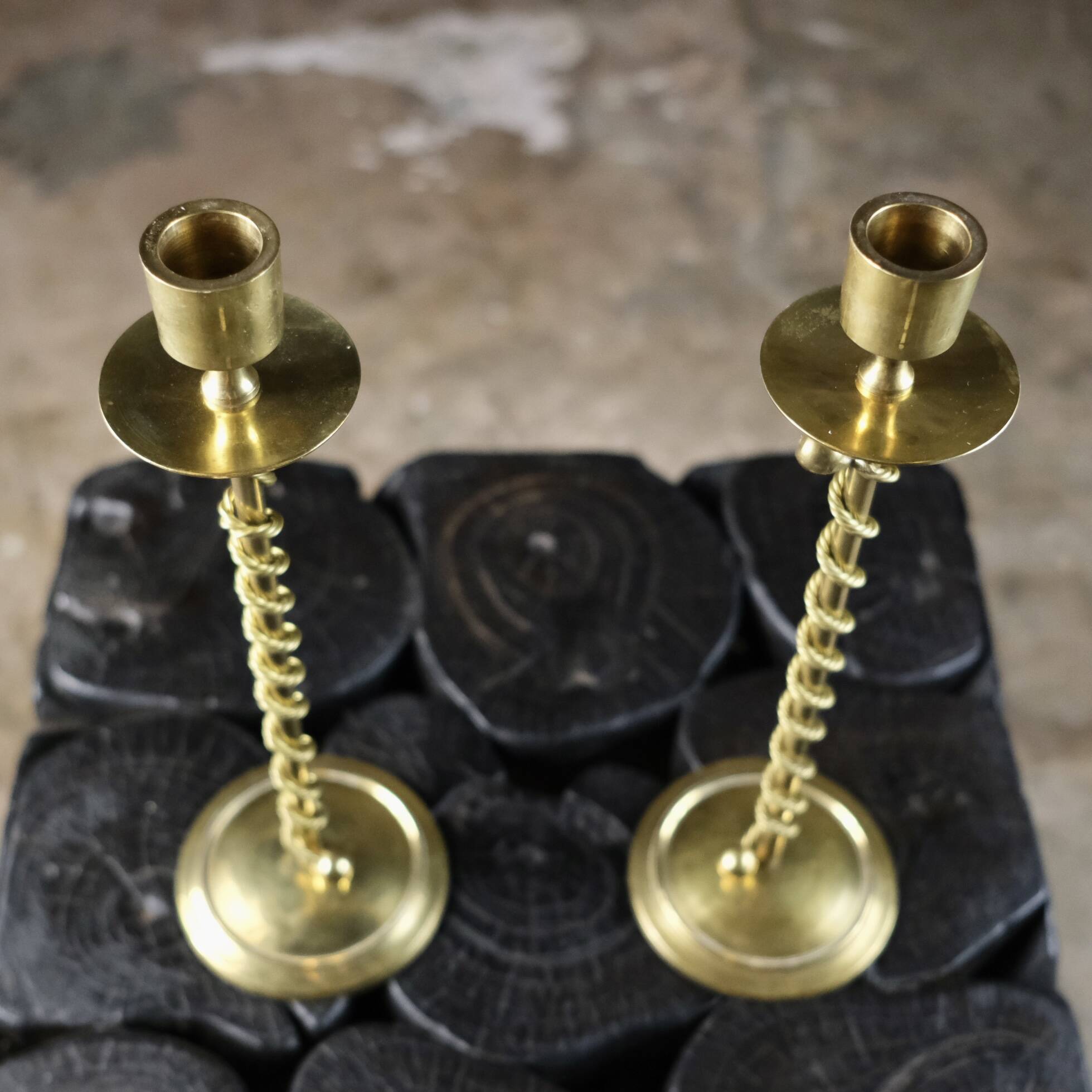 Pair of Art Deco twisted brass candlesticks, France, 1930s