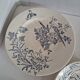 Set of 6 flat plates plus one earthenware dish.