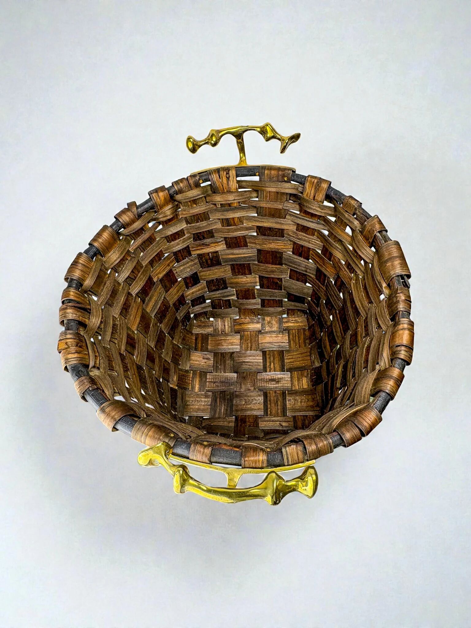 Brutalist XL basket by David Marshall, rattan & bronze handle, 1980s