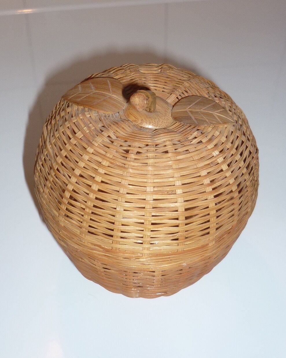 Apple box in vintage wicker