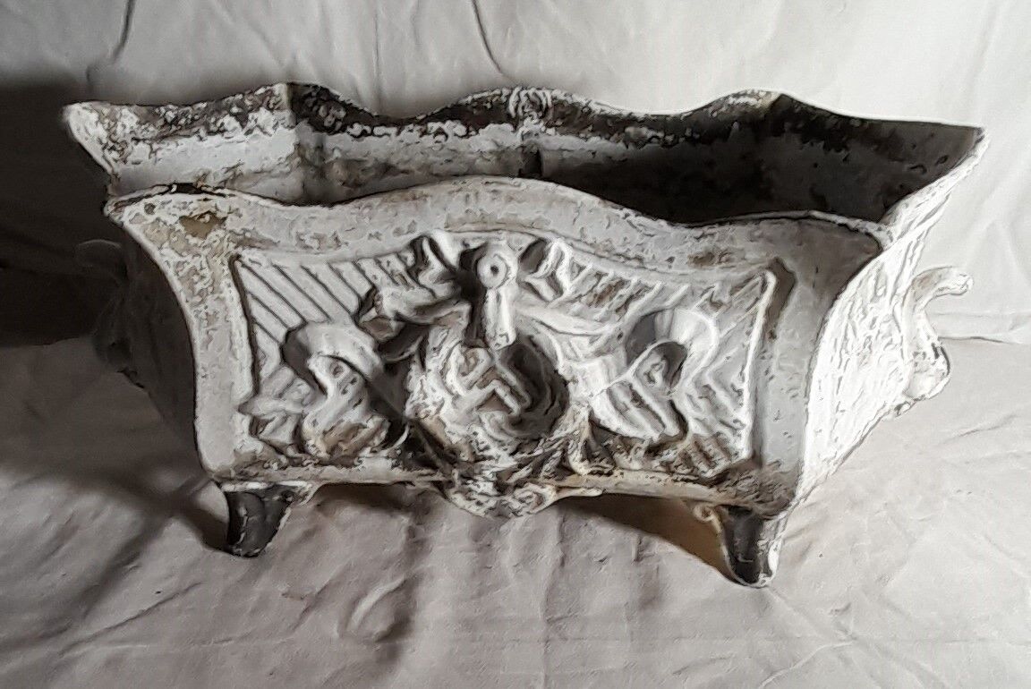 Old cast iron planter late nineteenth L 40 cm