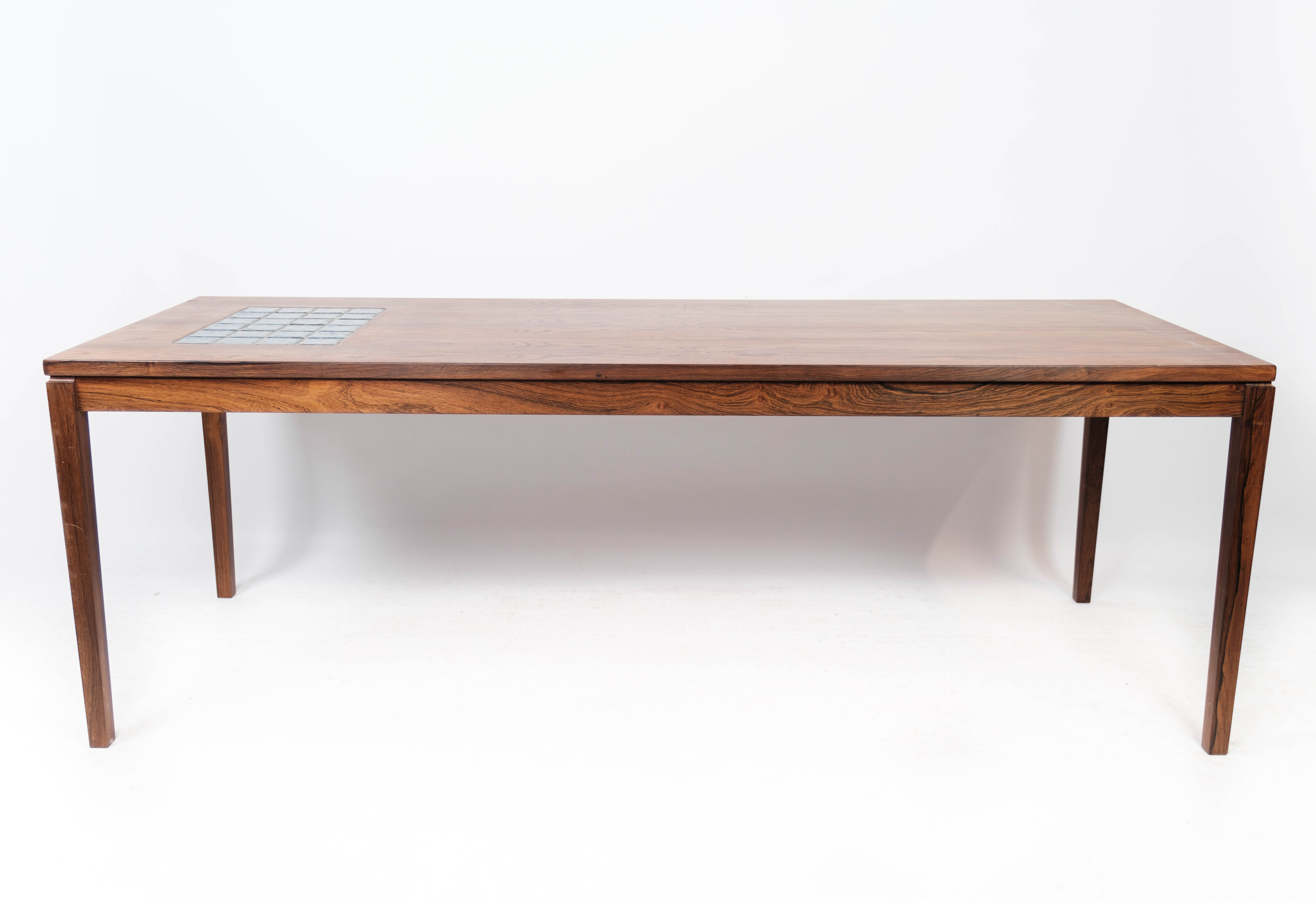 Coffee table in rosewood with blue tiles of Danish design from the 1960s