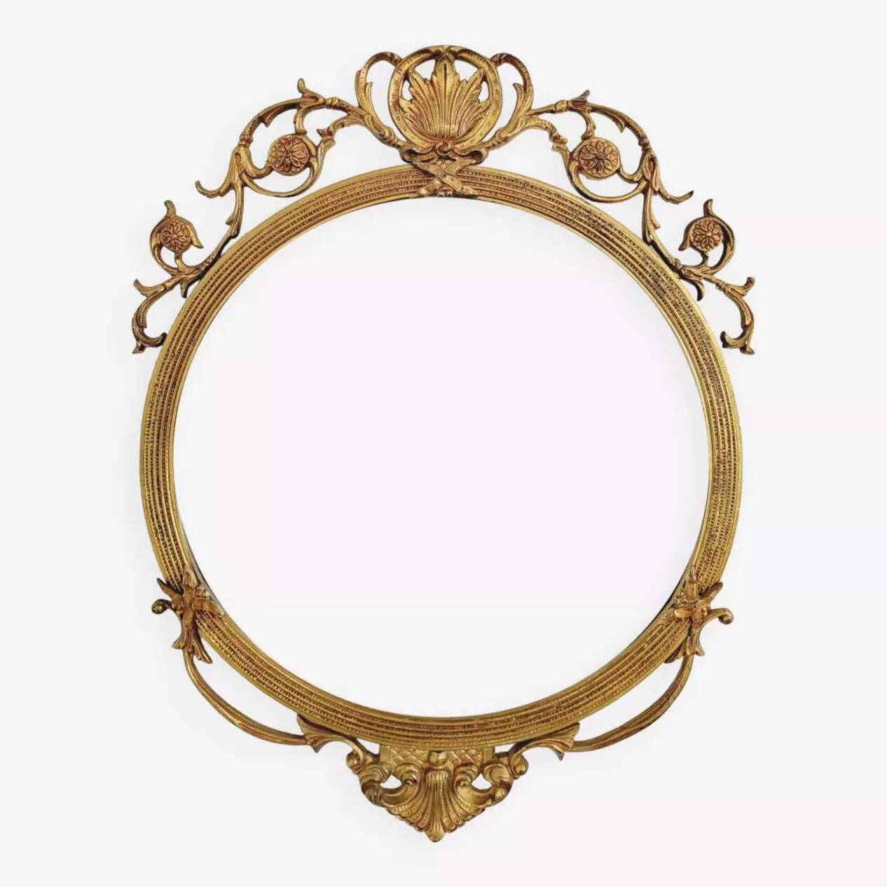 Round brass medallion style mirror