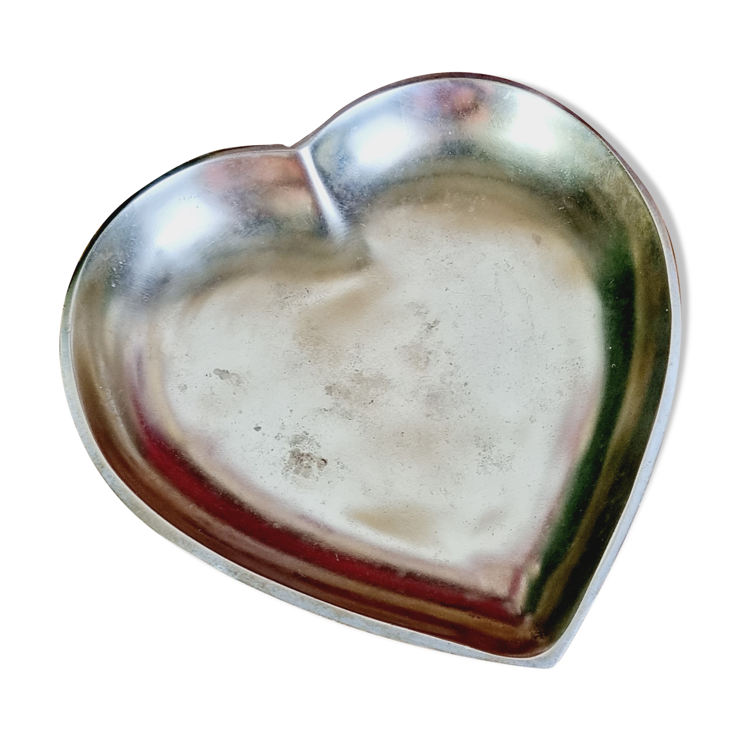 Empty brass heart pocket