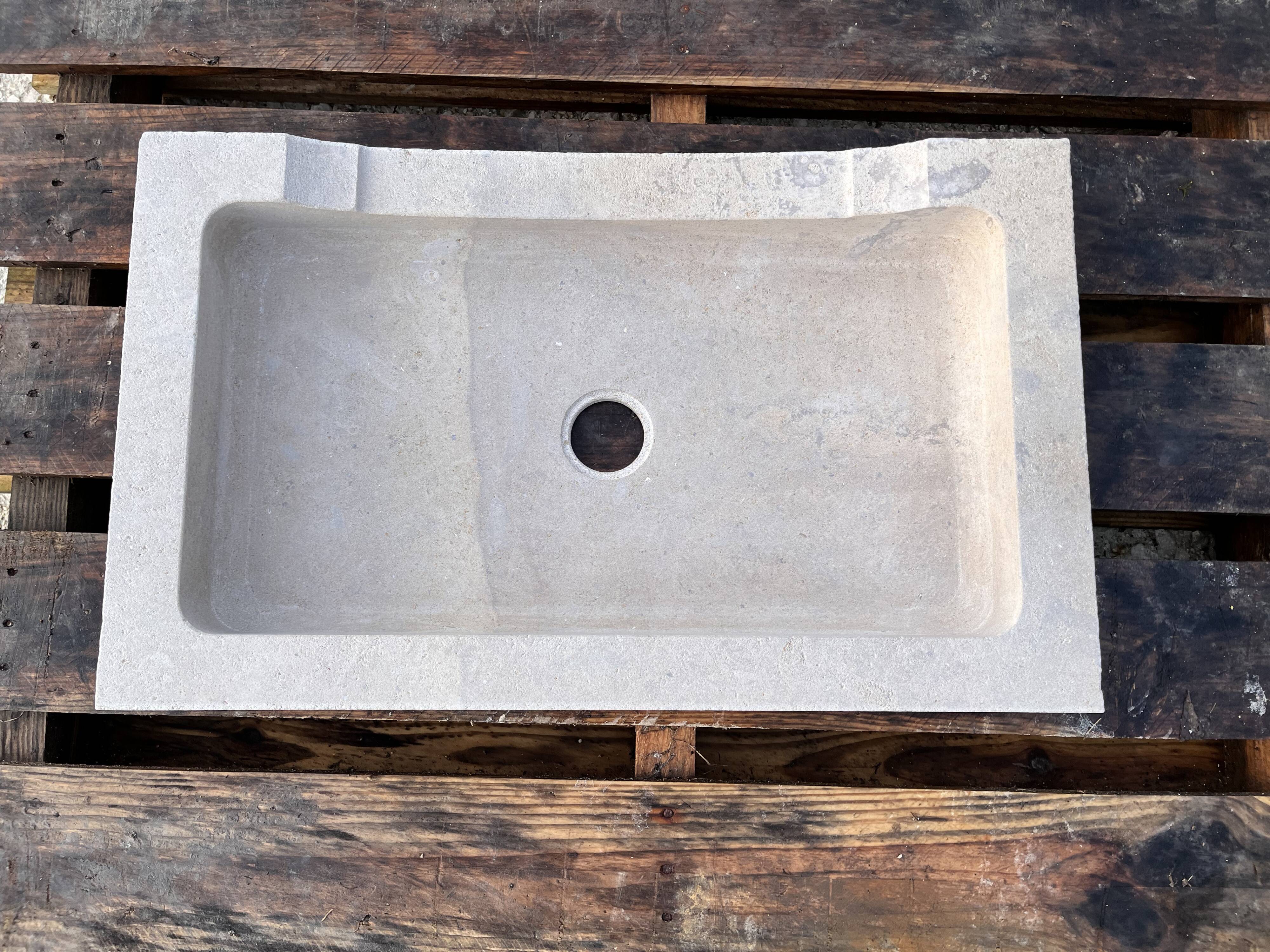 Cut stone sink