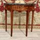Half-moon console in walnut period Louis XVI around 1770