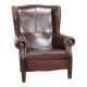 Fauteuil à oreilles confortable et bien entretenu en cuir de mouton