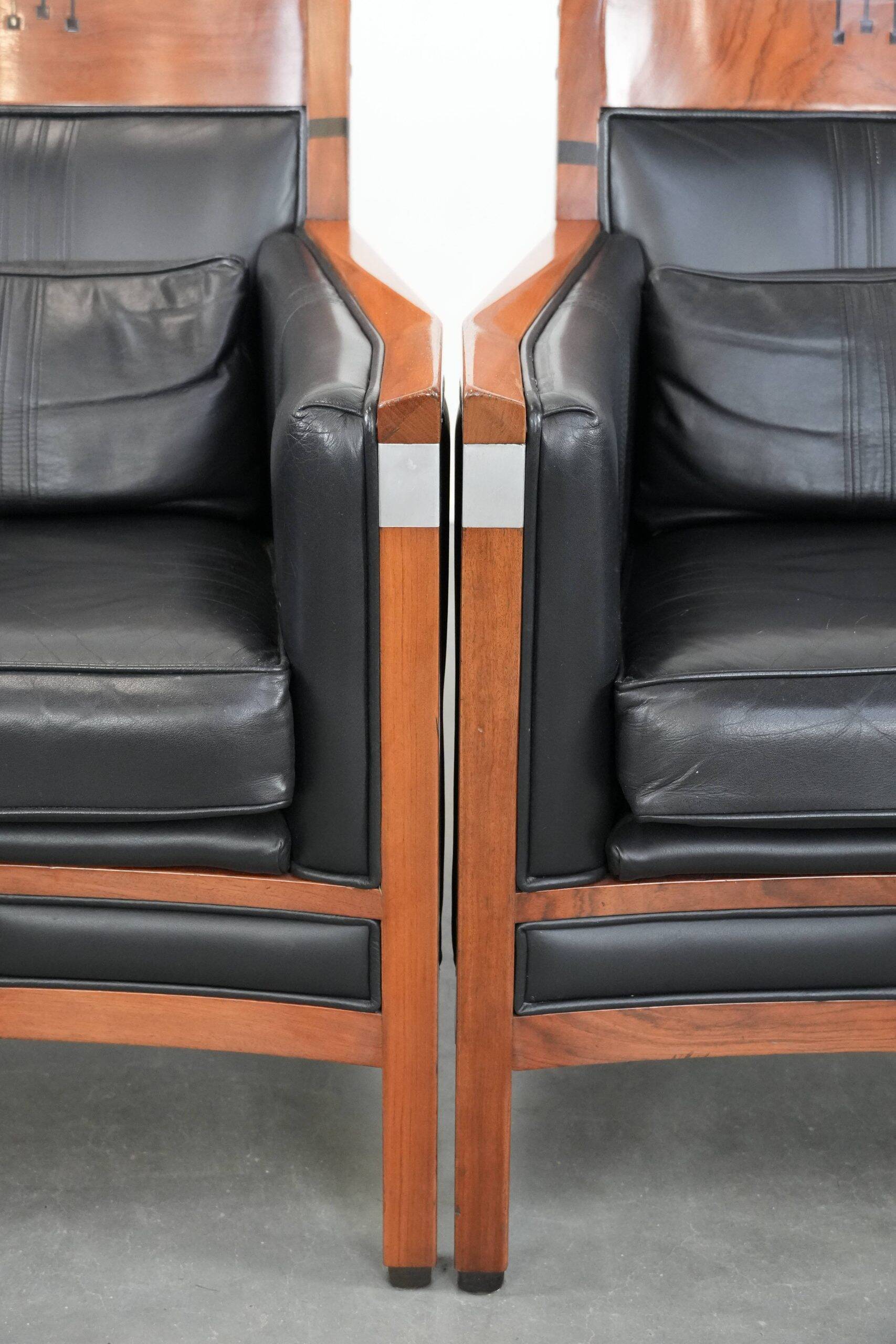 Set of  two black leather Art Deco design armchairs