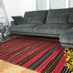 Hand-woven red wool rug