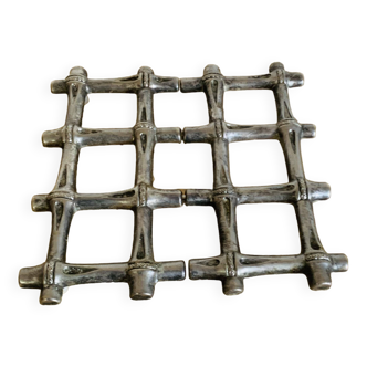Silver metal table mat imitating bamboo