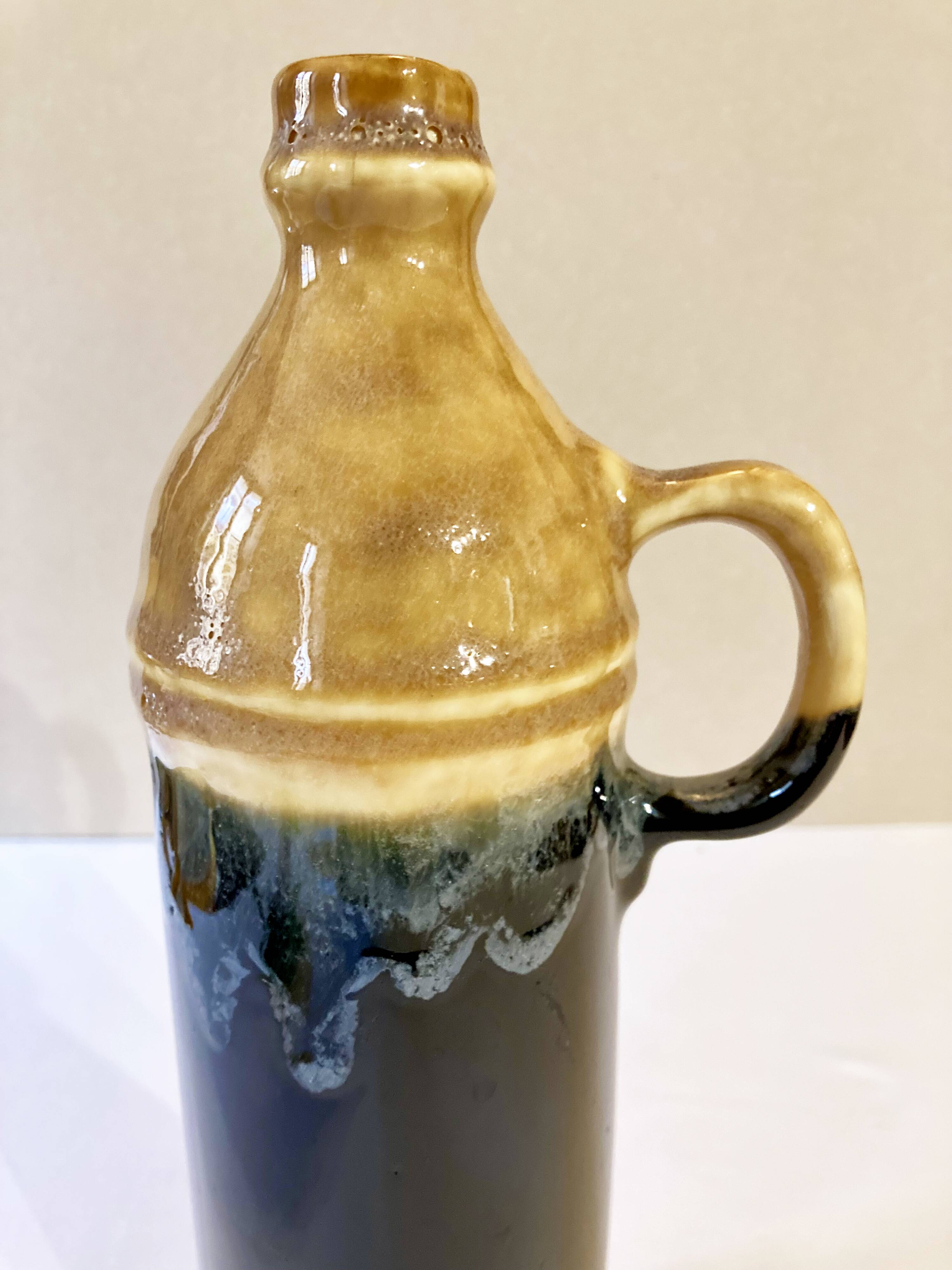 Enameled ceramic bottle with handle