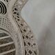 White wicker armchair