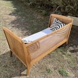 Baby cot in oak and caework
