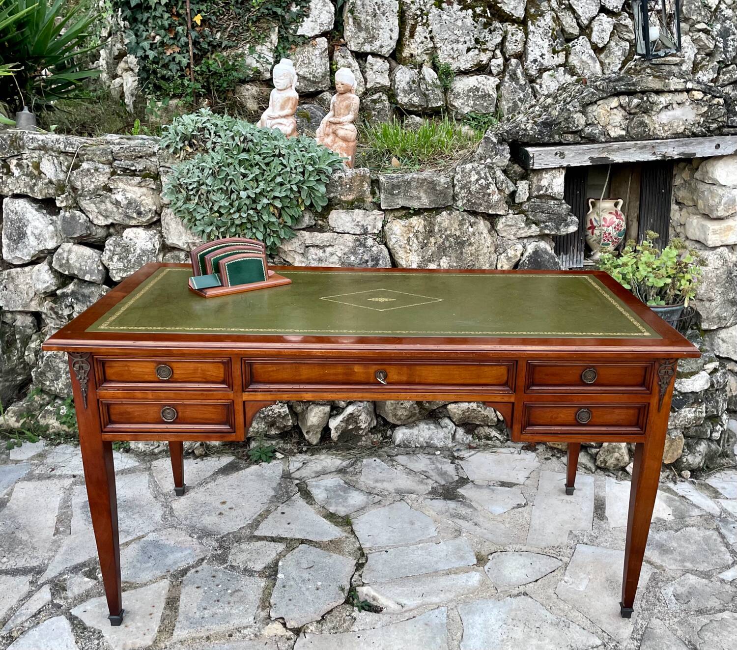 Elegant Louis XVI style mahogany flat desk from the 20th century