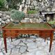 Elegant Louis XVI style mahogany flat desk from the 20th century