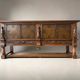 Mechelen Spanish sculptured sideboard / leather covered panels with decorated nails / 1960s