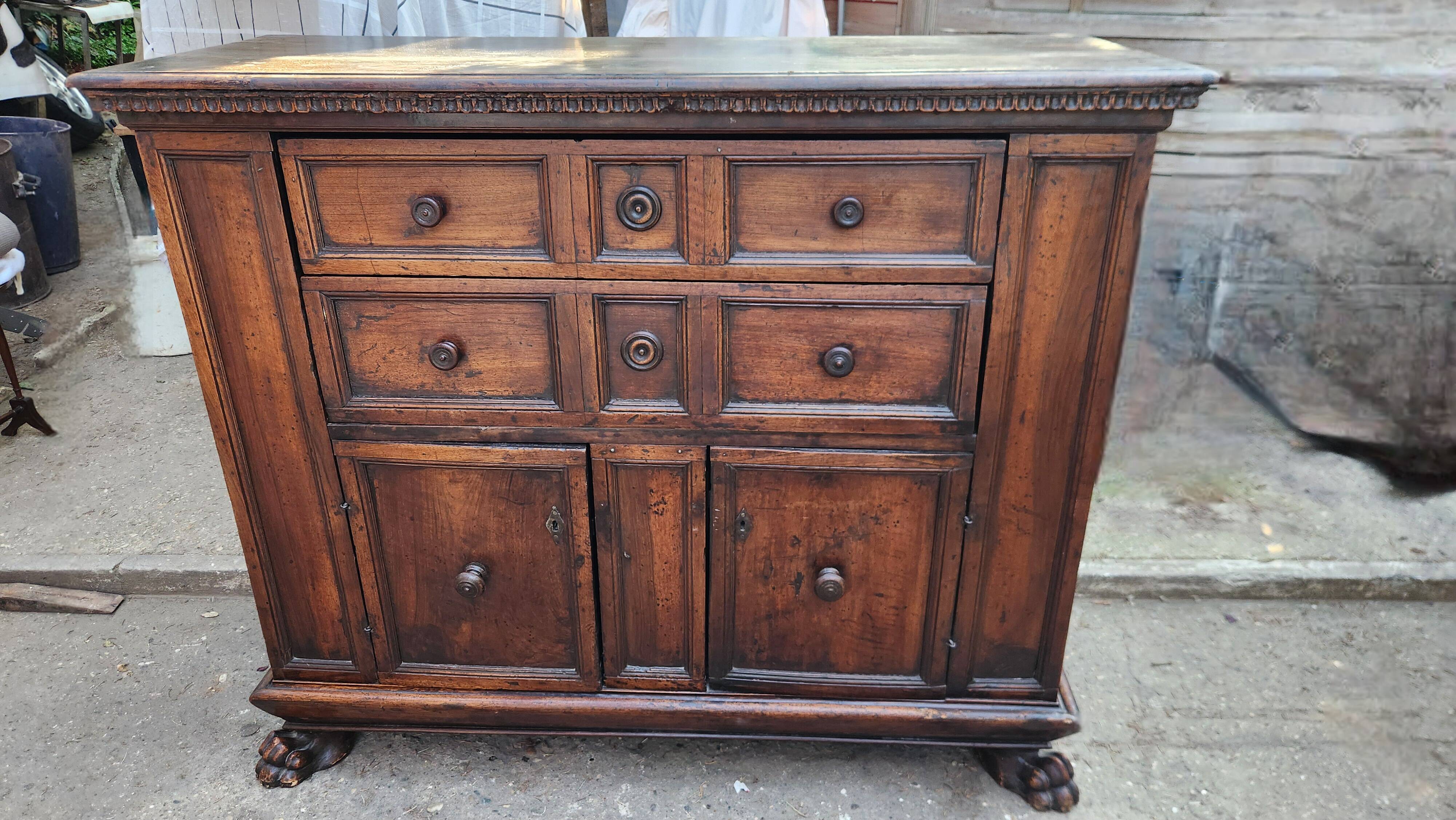 Antique commode from the 18th century in solid wood.