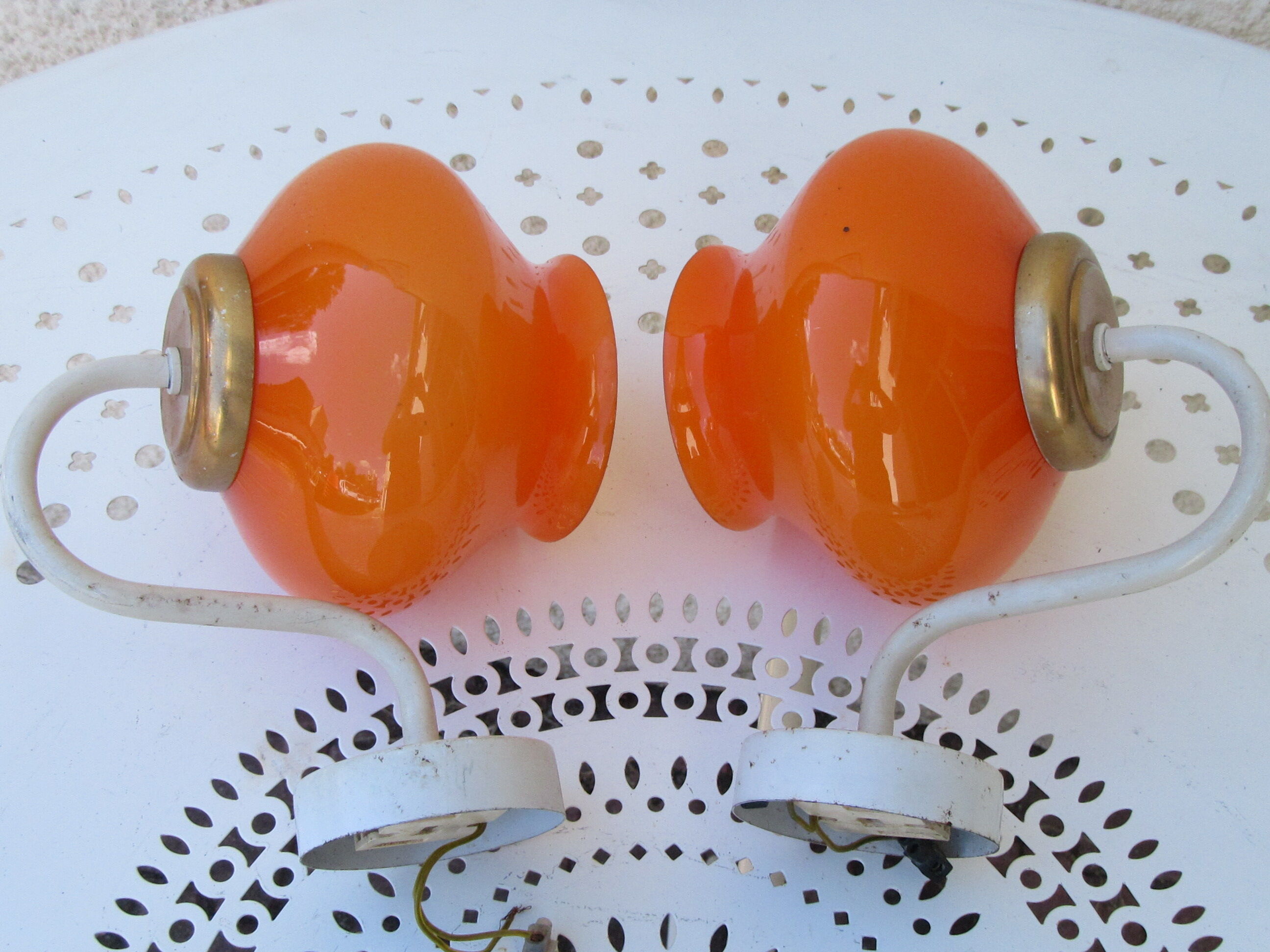 Pair of vintage orange hanging lamps