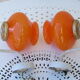 Pair of vintage orange hanging lamps