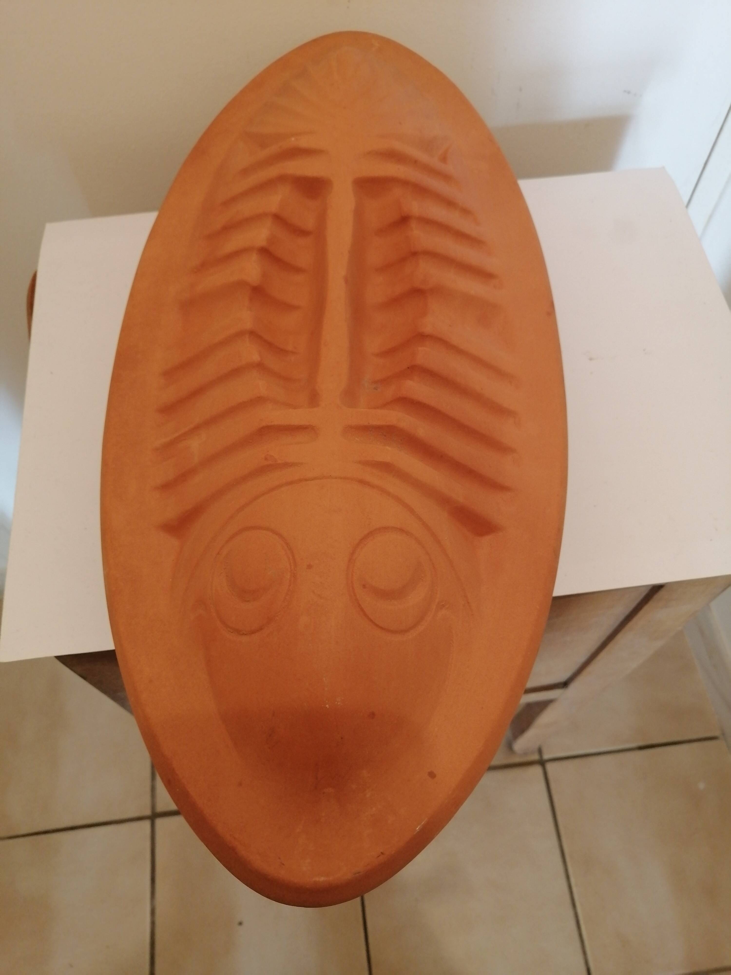 Fish shaped terracotta cooking dish