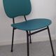Vintage chair in turquoise green vinyl with black metal legs