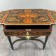 Writing table in Napoléon III style with marquetry and gilded bronzes, 19th century.