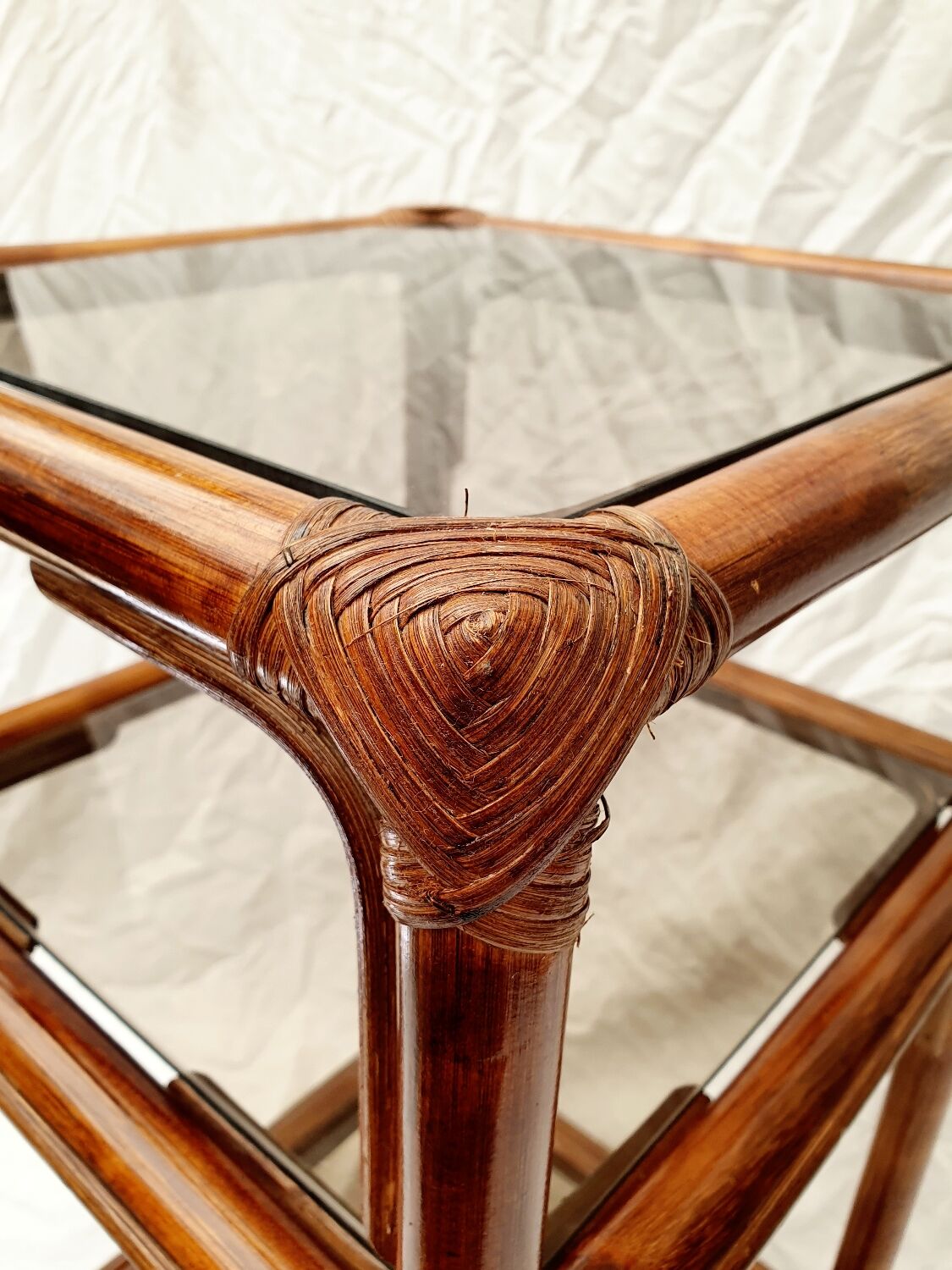 Rattan and smoked glass side table