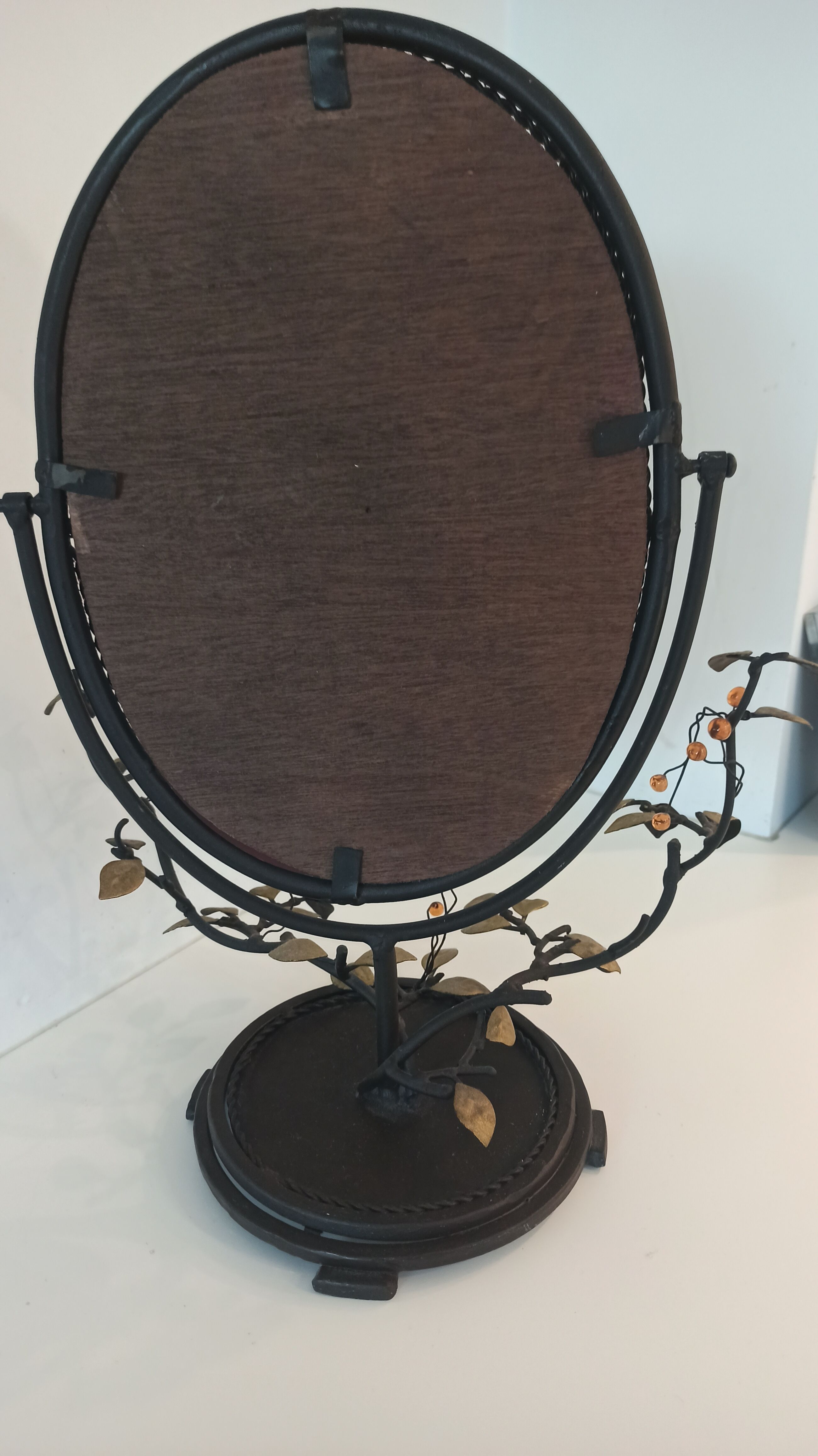 Table mirror, tilting psyche in patinated bronze decorated with leaves and fruits
