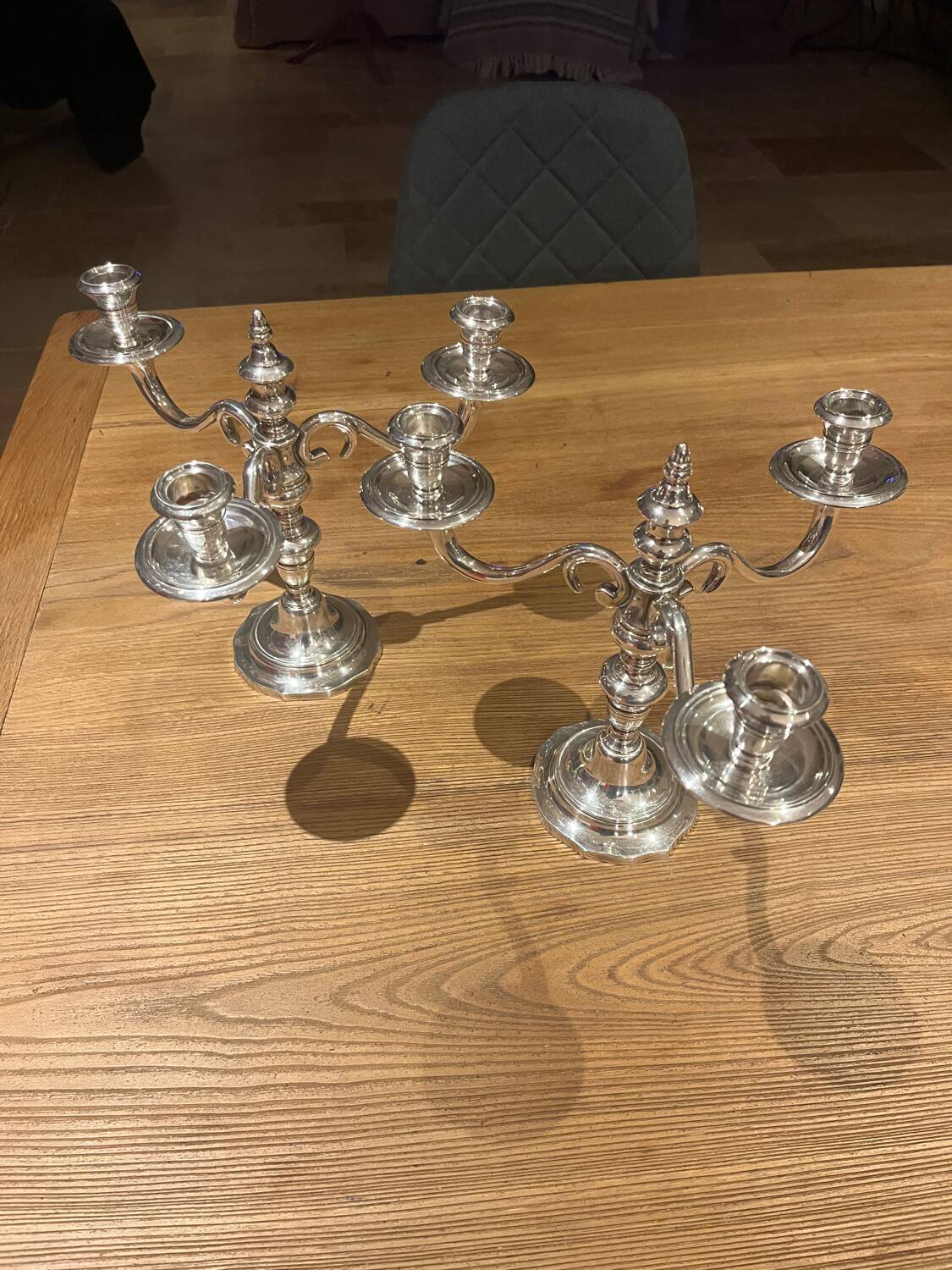 Pair of candelabra, three silver-plated metal lights
