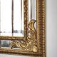 Grand miroir italien doré en bois à verre biseauté