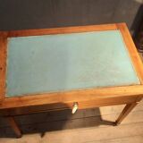 Yellow wooden writing table