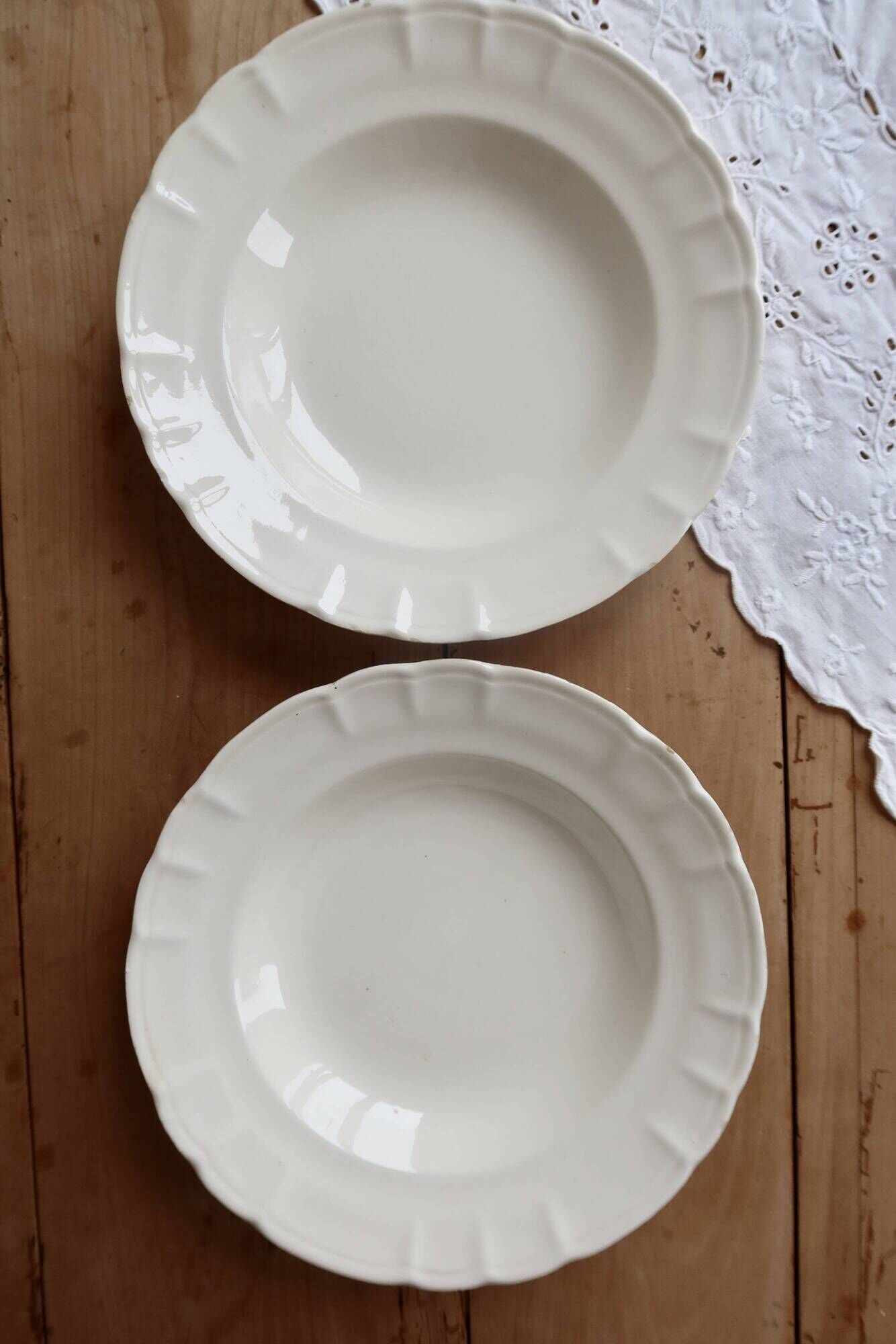 Pair of antique ivory faience deep plates ADP Luxcerae