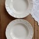 Pair of antique ivory faience deep plates ADP Luxcerae