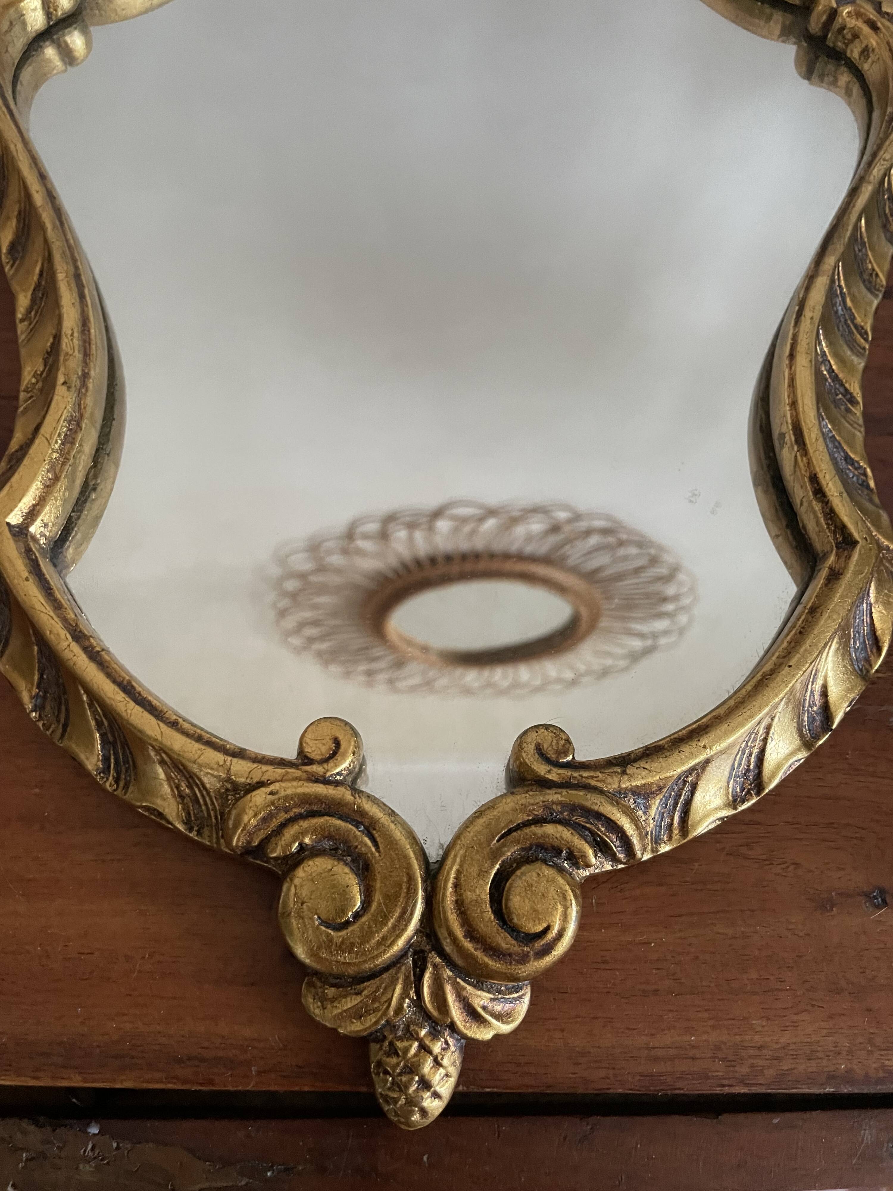 Baroque style mirror in gilded wood