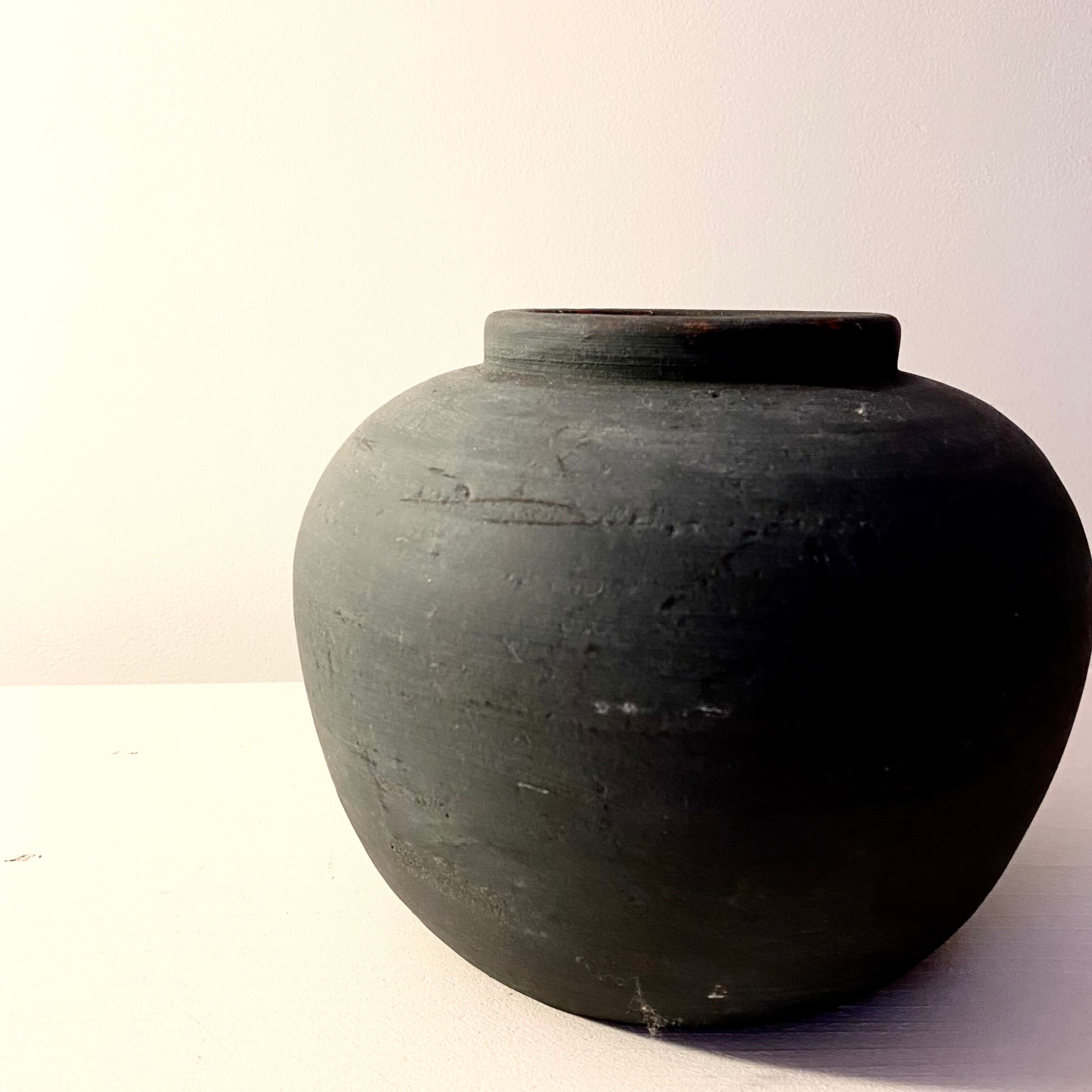 Black patinated terracotta vase