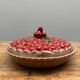 A trompe l’oeil strawberry pie dish